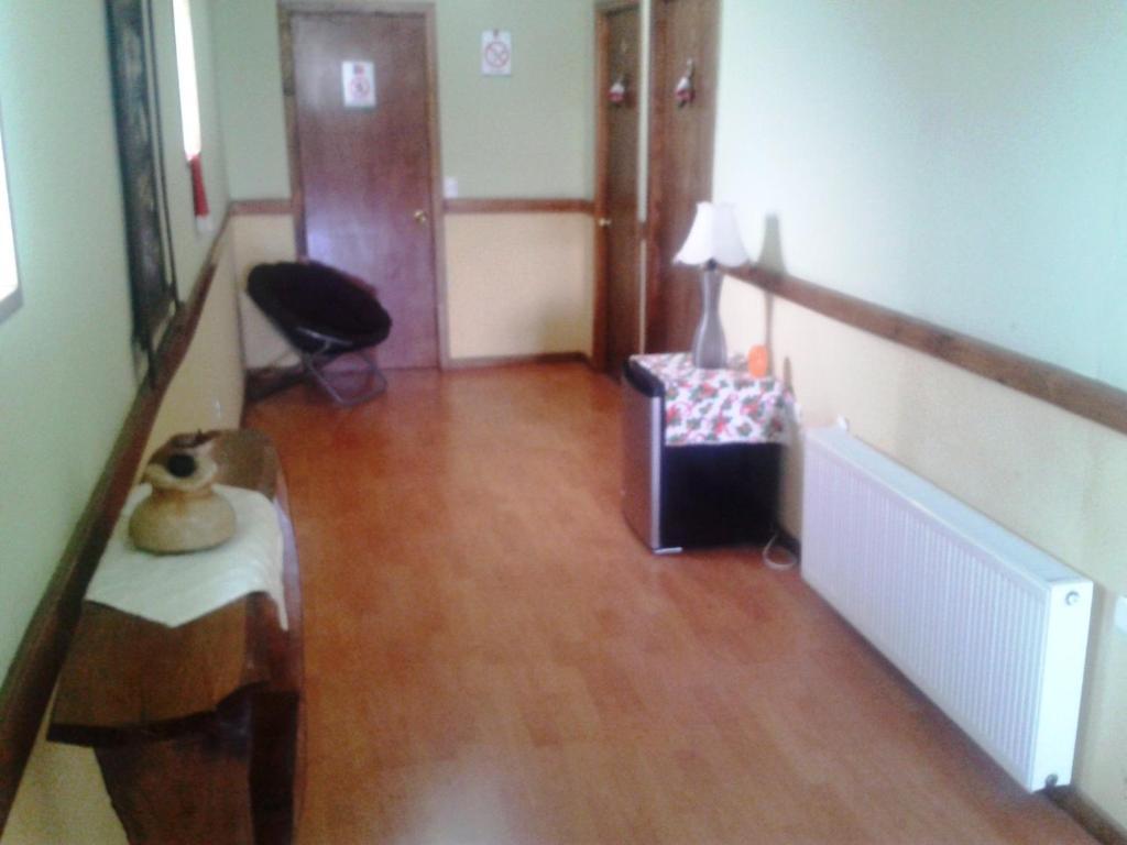 Hostal El Rincon Puerto Natales Szoba fotó